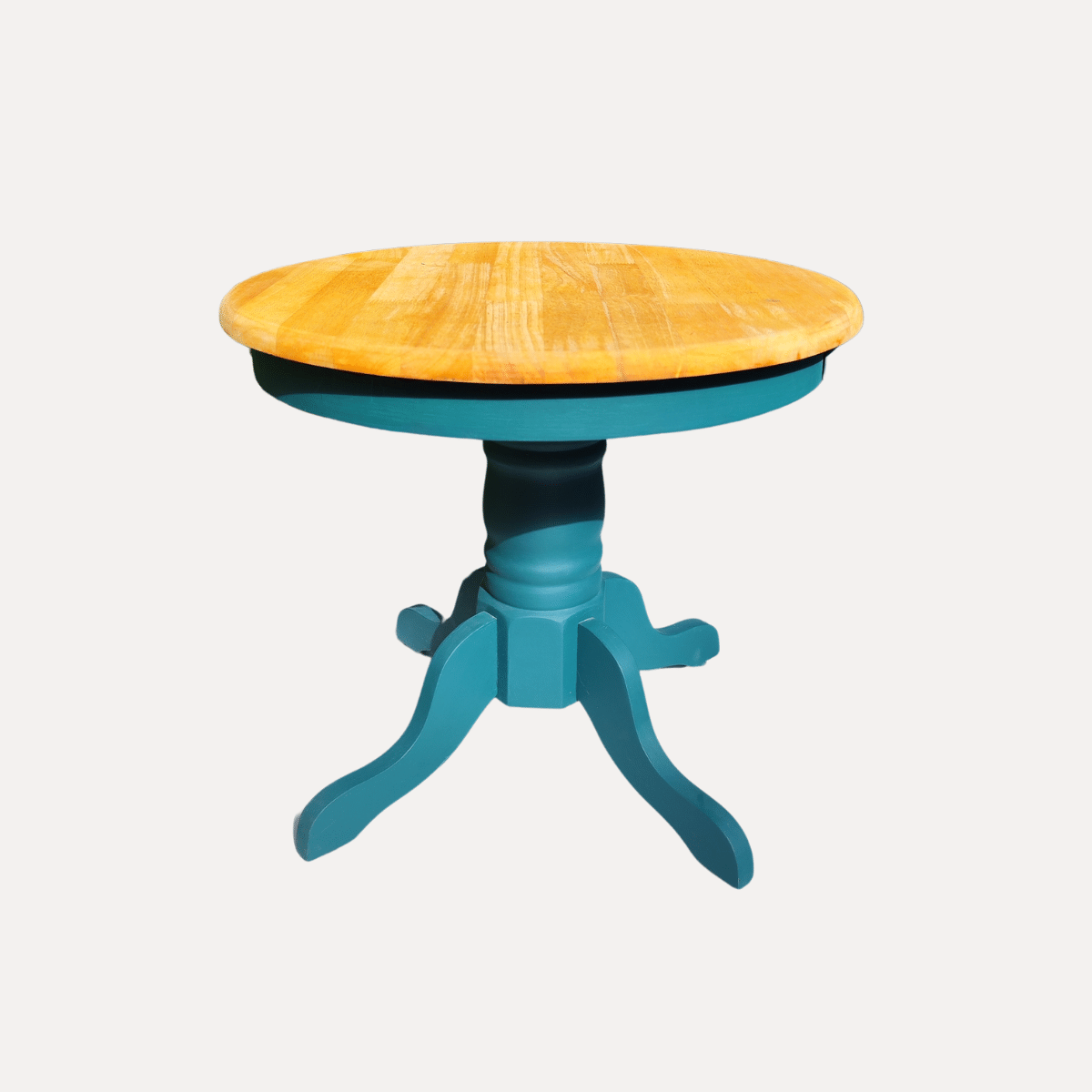 Table basse ronde avec plateau en bois naturel et pied central peint en bleu